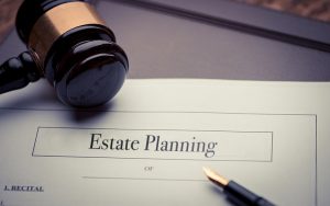 Document that says "estate planning" with a gavel